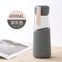 Load image into Gallery viewer, Travel drink ware Portable bottle new design glass bottle Transparent bottle water tea glass drinking bottle with silicone set