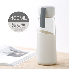 Load image into Gallery viewer, Travel drink ware Portable bottle new design glass bottle Transparent bottle water tea glass drinking bottle with silicone set